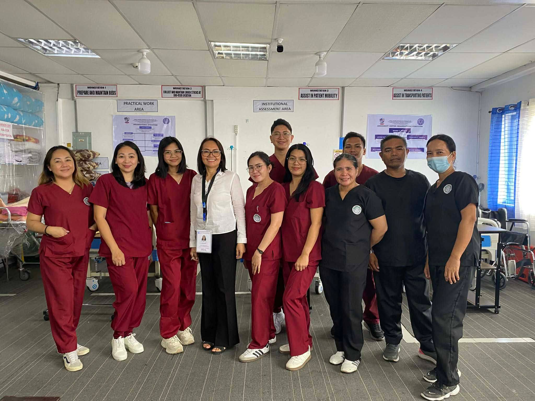 Damla learners and staff in a training room